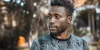Man photographed outdoors in Kampala