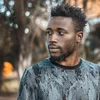 Man photographed outdoors in Kampala