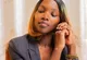 Woman in a blazer in an office setting