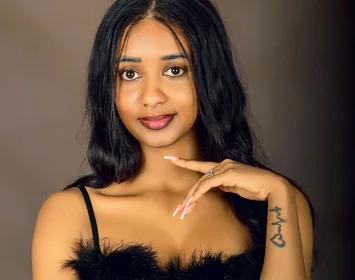 Woman photographed in a Kampala portrait studio