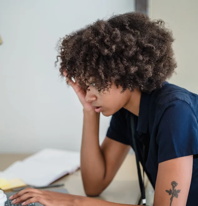 Black businesswoman working on a laptop
