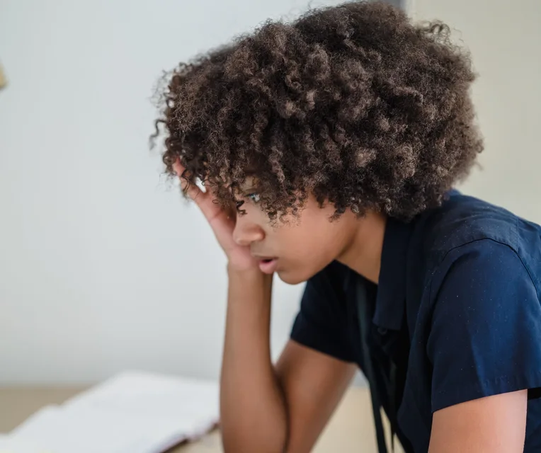 Black businesswoman working on a laptop