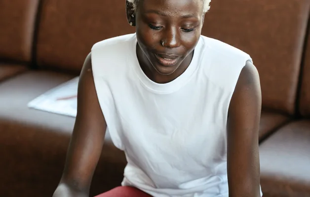 Black businesswoman reviewing documents at a desk