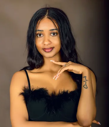 Woman photographed in a Kampala portrait studio