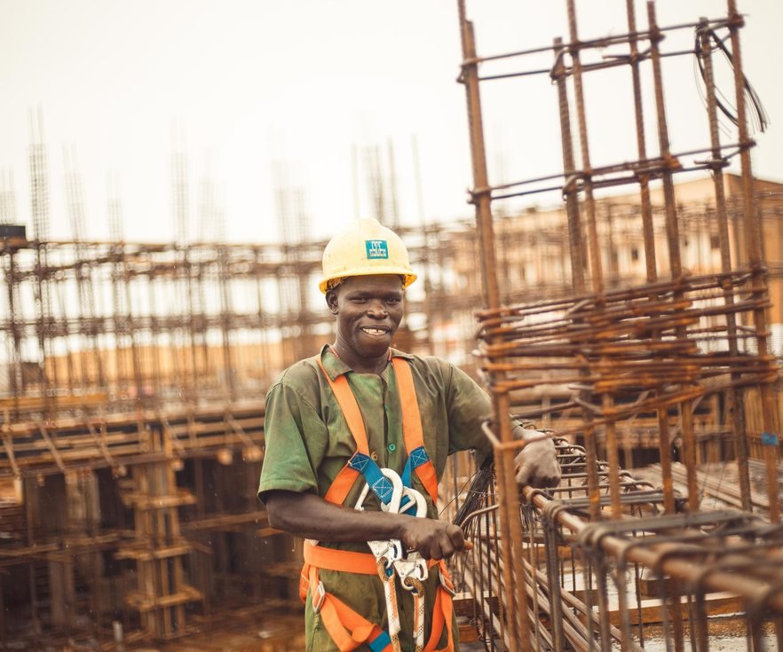 Construction worker wearing safety equipment in Kitgum