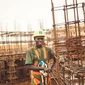 Construction worker wearing safety equipment in Kitgum