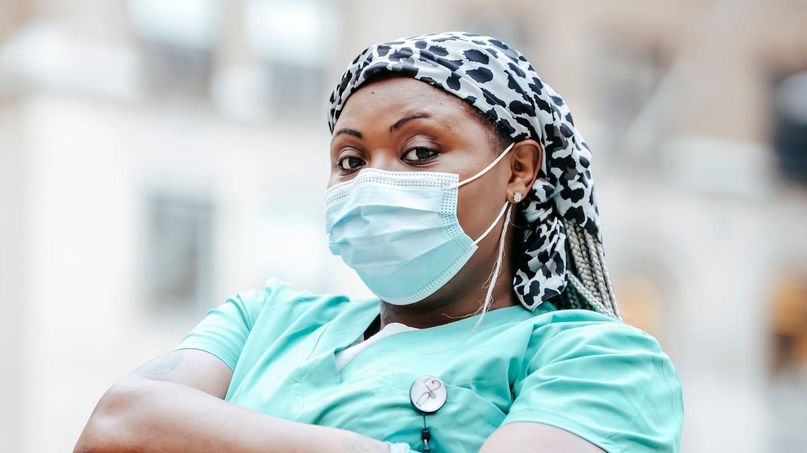 Black female doctor wearing a medical mask