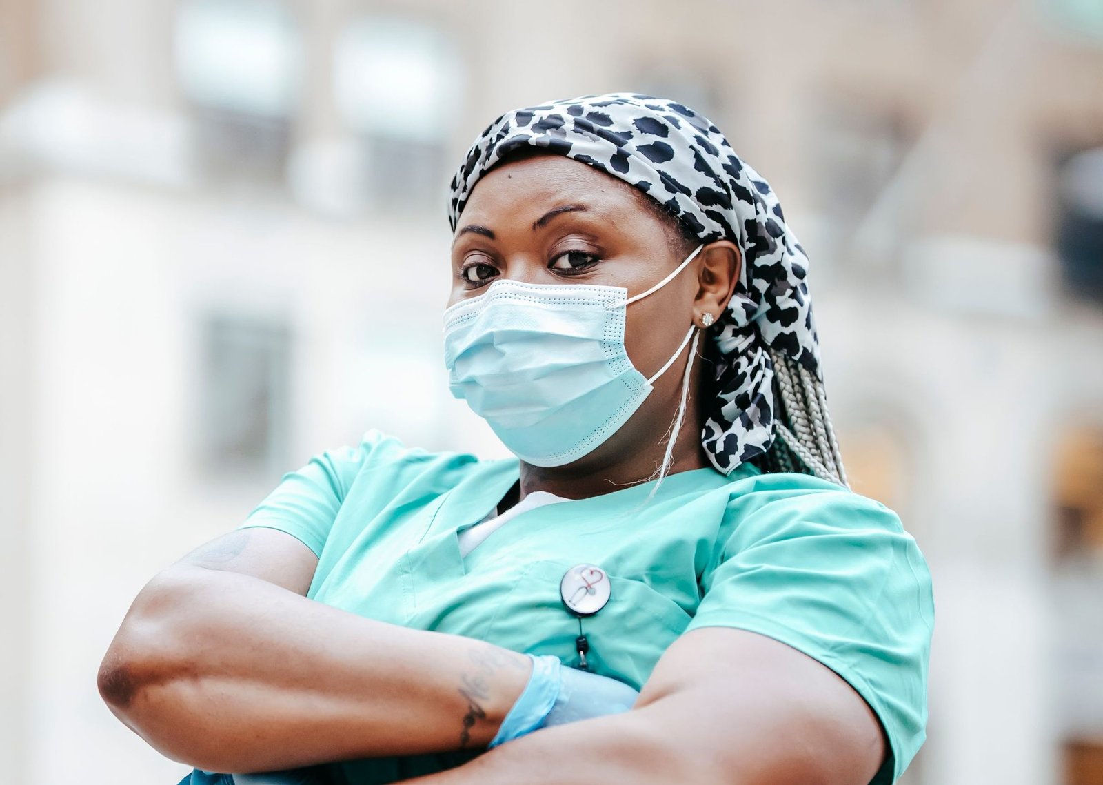 Black female doctor wearing a medical mask
