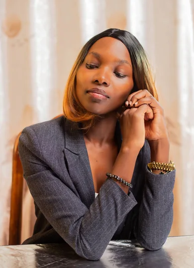 Black businesswoman reviewing documents at a desk