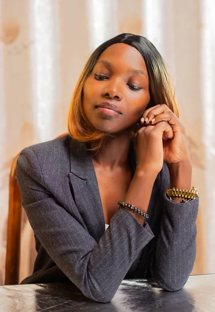 Black businesswoman reviewing documents at a desk