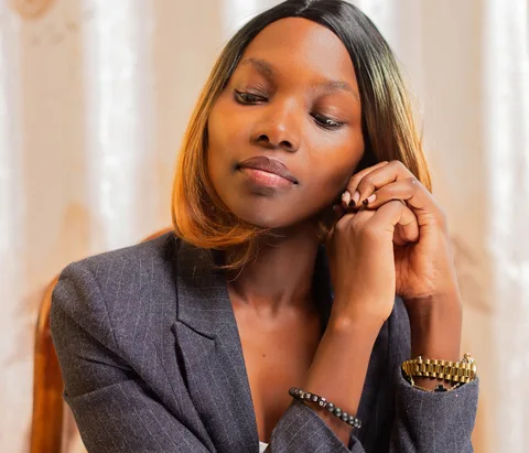 Black businesswoman reviewing documents at a desk