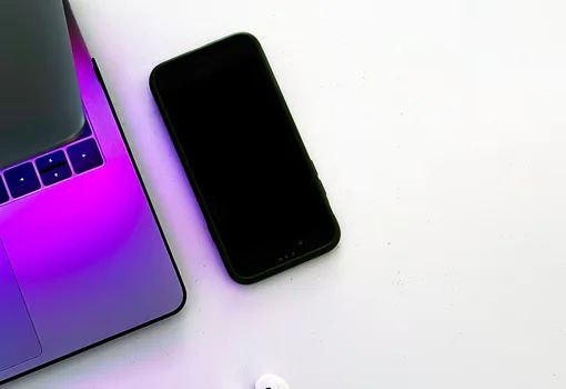 Laptop and mobile devices photographed in Kampala