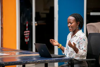 Woman using a laptop in Kampala
