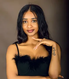 Woman photographed in a Kampala portrait studio