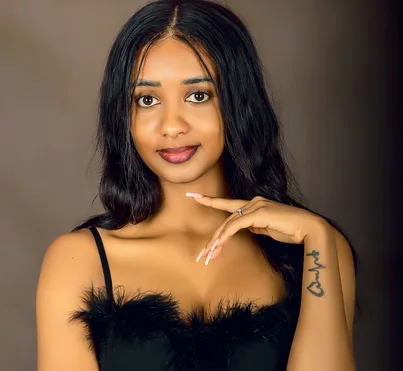 Woman photographed in a Kampala portrait studio