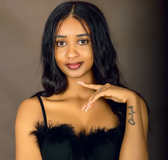 Woman photographed in a Kampala portrait studio