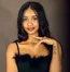 Woman photographed in a Kampala portrait studio
