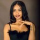 Woman photographed in a Kampala portrait studio