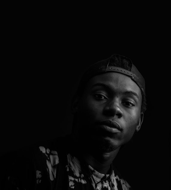 Black and white studio portrait in Kampala