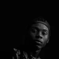Black and white studio portrait in Kampala