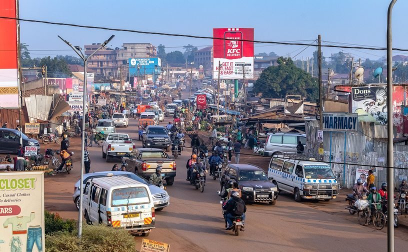 A busy Kampala street with local transport