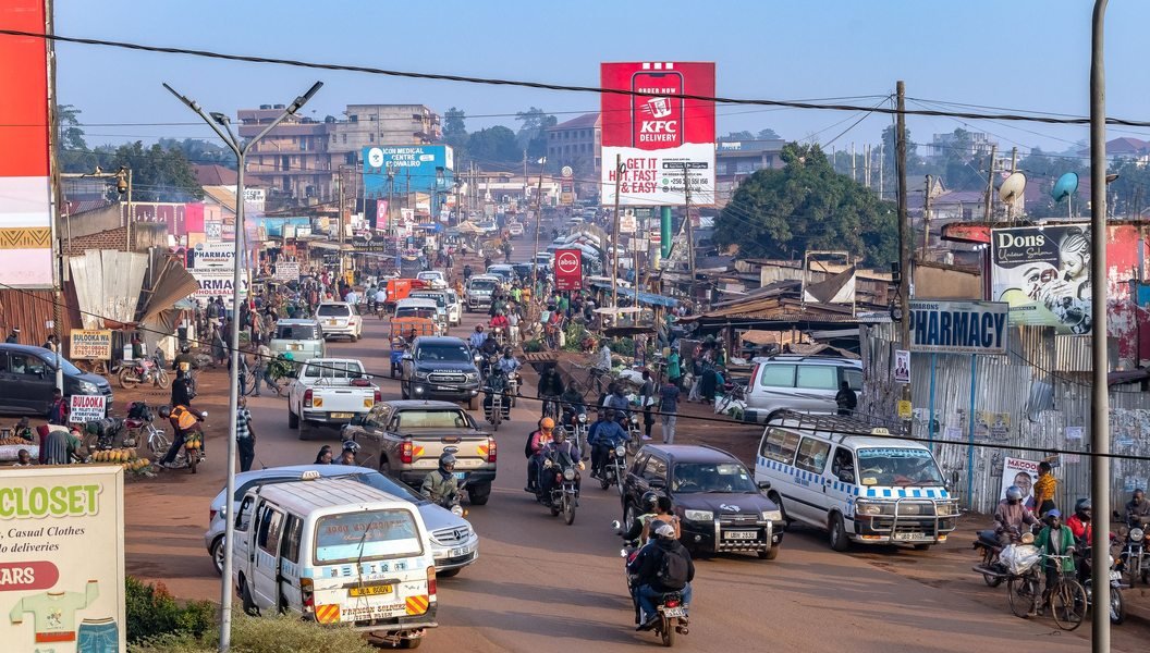 A busy Kampala street with local transport