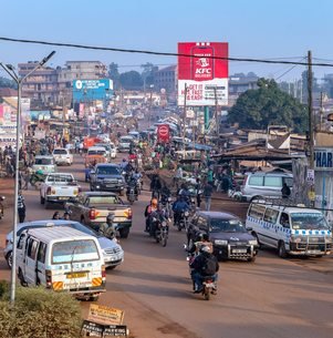 A busy Kampala street with local transport