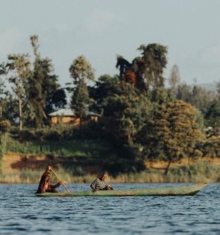 Canoe on a lake in the Ugandan landscape