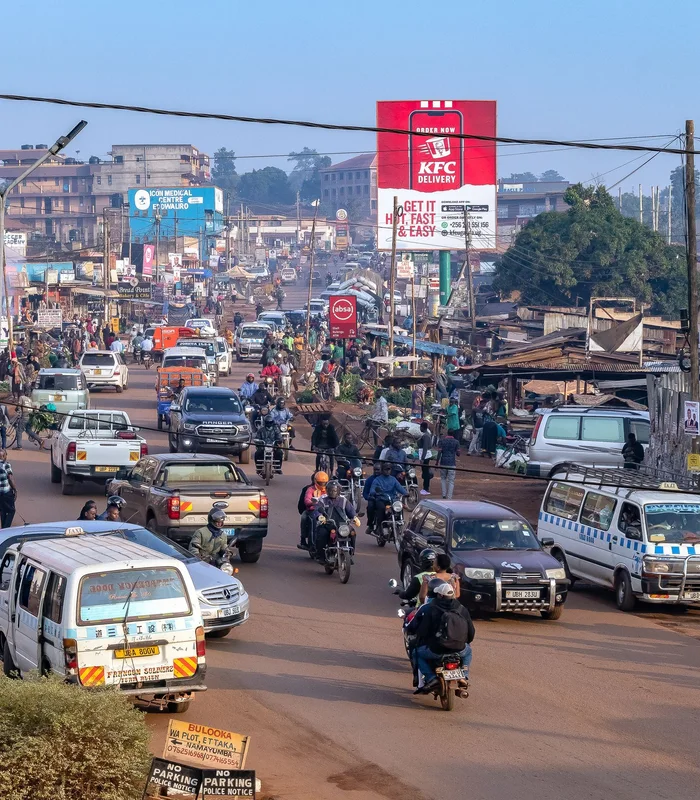A busy Kampala street with local transport