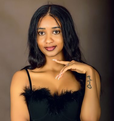 Woman photographed in a Kampala portrait studio