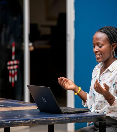 Woman using a laptop in Kampala