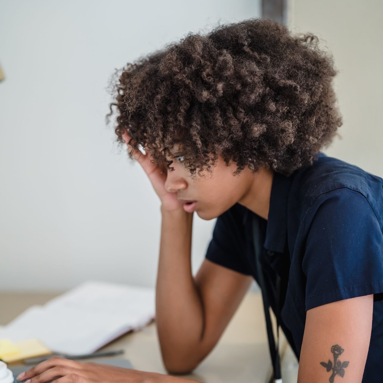 Black businesswoman working on a laptop