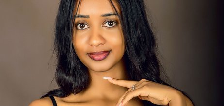Woman photographed in a Kampala portrait studio