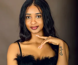 Woman photographed in a Kampala portrait studio